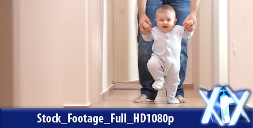 Baby Learning to Walk with Father's Help Indoors