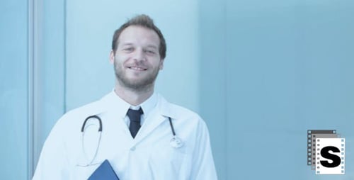 Smiling Doctor in Hospital Setting