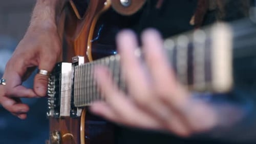 Closeup Guitarist Performs on Stage with Electro Guitar