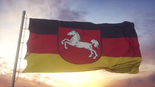 Realistic Lower Saxony Flag Waving Against Sunset Sky