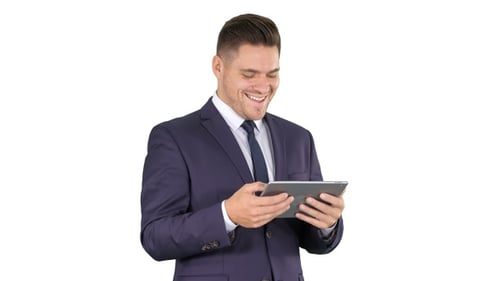 Businessman Reading or Working on a digital tablet on white
