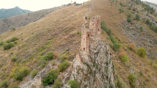 Aerial View of an Ancient Watchtower Fortress Ruin in the Mountains Beautiful Breathtaking Vista