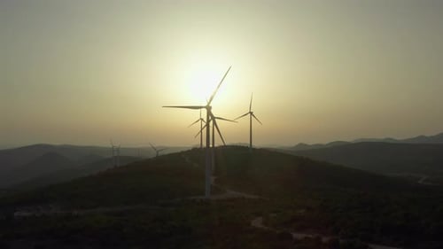 Aerial View Silhouette of Windmills That Produce Electricity at Sunset