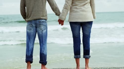 Mature couple enjoying on beach