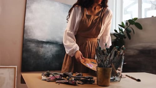 Art Studio Young Woman Artist Preparing for the Painting
