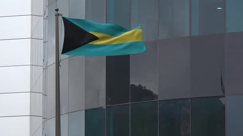 Waving Flag of Bahamas on Modern Building