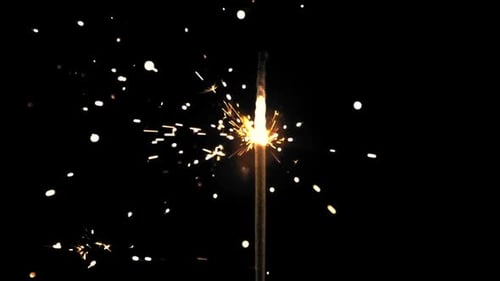 Glowing Sparkler Bursts with Light and Sparks