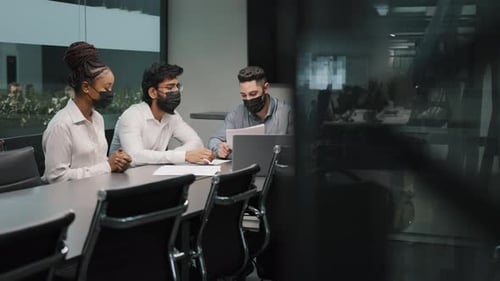 Multiethnic Business Team Diverse Partners Workers Colleagues in Medical Protective Masks in Office