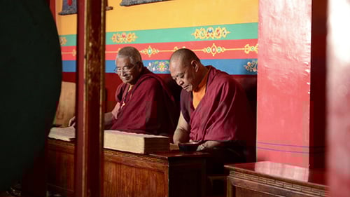 Monks Reading Inside an Ornate Religious Temple
