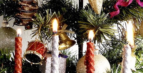 Festive Christmas Tree with Candles and Snow