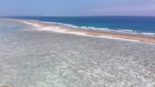 Ocean Coastline and Barrier Reef at Low Tide Zanzibar Matemwe Aerial View
