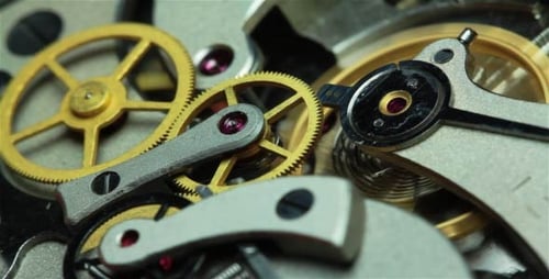 Mechanical Watch Gears Spinning in Close-Up