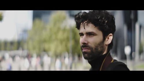 Man Taking a Photo in the City