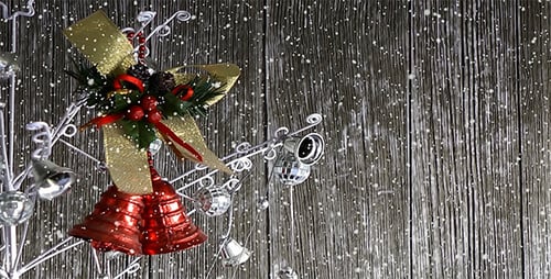 Decorated Christmas Tree with Festive Bells and Snow
