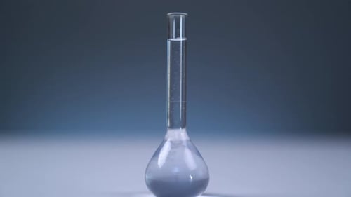 Science Experiment with Clear Flask and Liquid