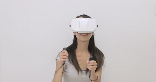 Woman Enjoys Virtual Reality Experience With Headset