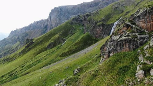 Scenic Green Mountains with Waterfall Aerial View
