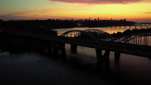 Night City Scape with Huge River and Highway Bridge