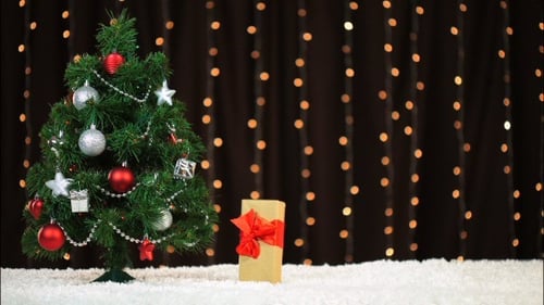 Decorating a Christmas Tree with Baubles and Ornaments