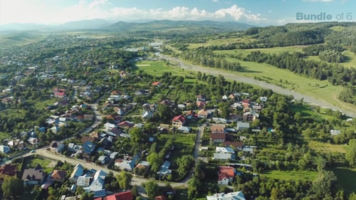 Flying Above Mountain Town