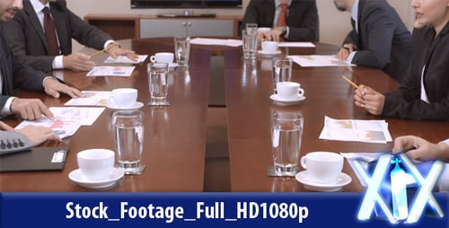 Business Meeting with Documents and Coffee at Table