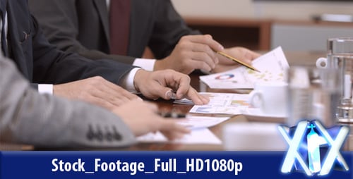 Business Team With Sales Chart