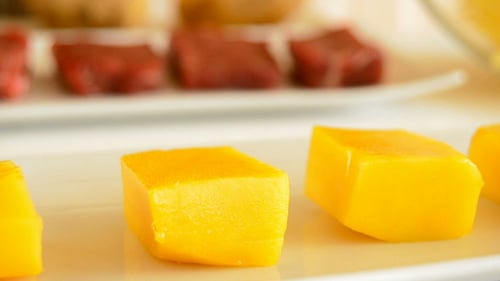 Cubes of Mango Fruit in a Kitchen Table