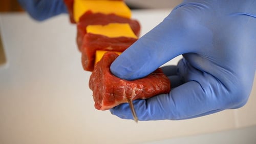 Preparing Meat and Cheese Skewers, Close Up