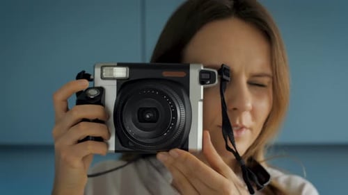 Taking Picture With Instant Camera