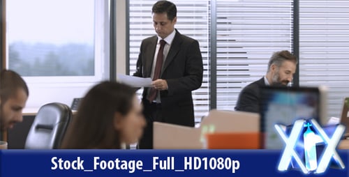 Busy Professionals Working in Modern Office