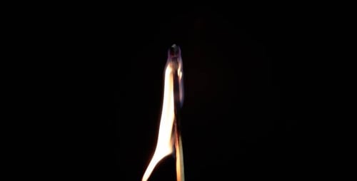 Igniting Matchstick with Flame Burning Close Up