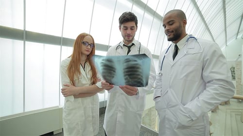 Doctors Collaborating in a Modern Hospital Setting
