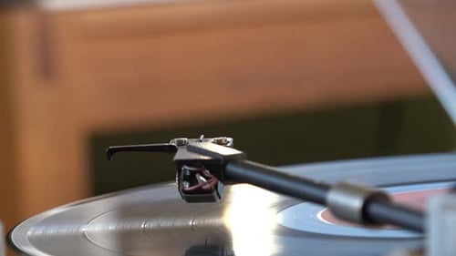 Record Player Needle on Spinning Vinyl Record