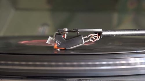 Needle Plays Music on Vinyl Record Player