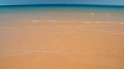 Shallow Of Sea On Gold Sand Beach