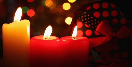 Candles and Gift with Festive Holiday Lights