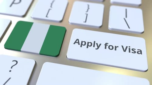 Pressing Apply for Visa Button with Nigeria Flag on Keyboard