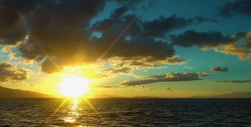 Sunset and Clouds and Sea