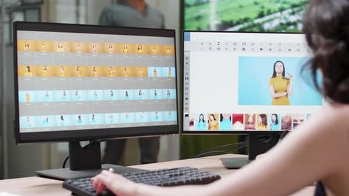 Woman Edits Photos Using Graphic Design Software