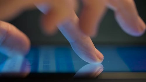 Close Up of Hand Using Computer Touch Screen 14