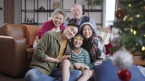 Three Generation Family Christmas Portrait in Living Room