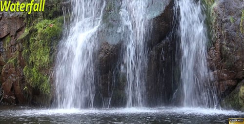 Refreshing Waterfall in a Lush Natural Setting