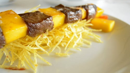 Delicious Meat and Fruit Skewer Garnished on Plate