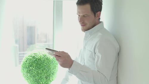 Man using smart phone