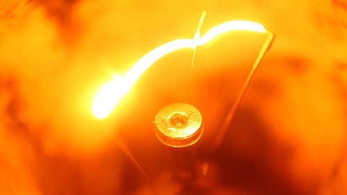 Close Up of Glowing Lightbulb Filament