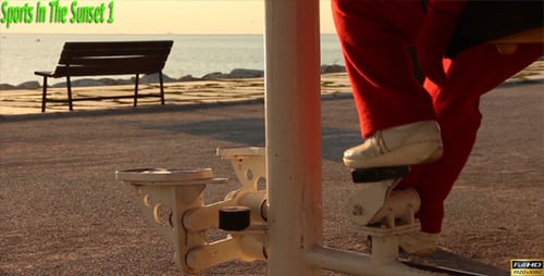 Person Exercising Leg Press at Outdoor Beach Gym
