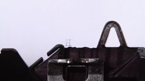 Close Up of Vintage Typewriter Typing Hello