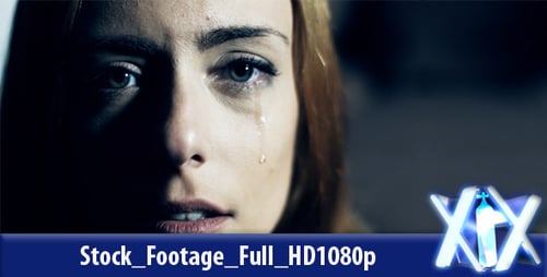 Sorrowful Woman Crying in Dark Home Interior