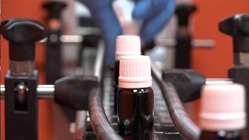 Medicine Bottles Moving on Factory Production Line