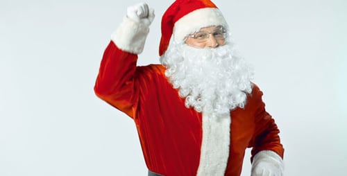 Cheerful Santa Claus Dancing in Festive Costume